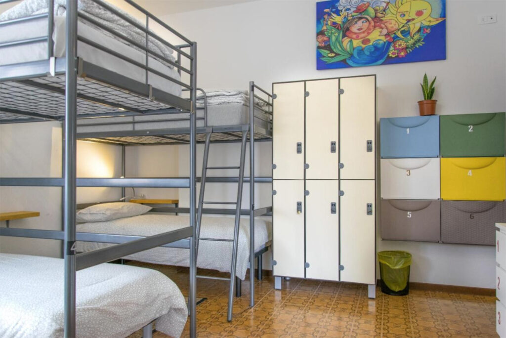 an interior view of a dormitory room at the Posada Hostel in Verona, Italy