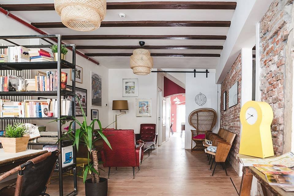 The downstairs lounge area of The Hostello hostel in Veronetta, Verona, Italy