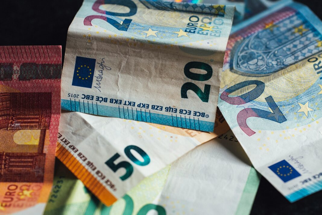 several euro bills collected for tax